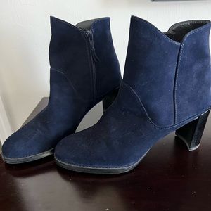 Blue suede zip up ankle boots.